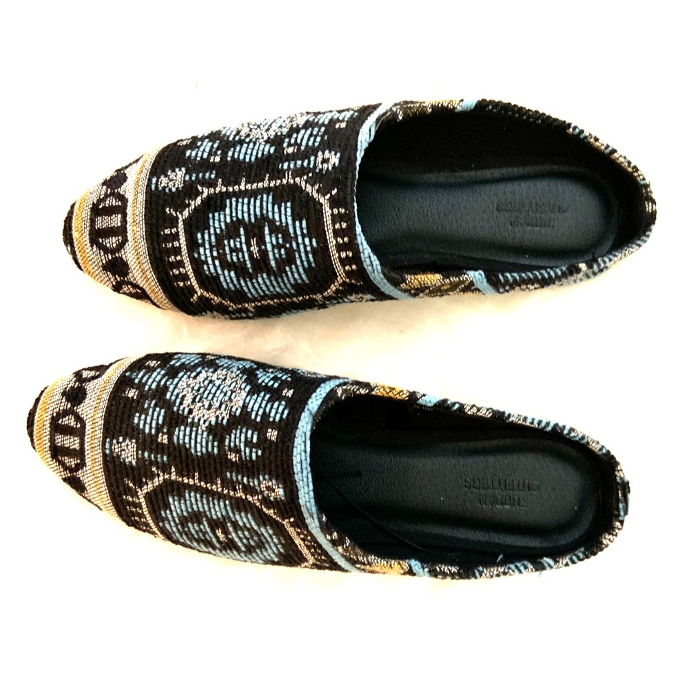Never worn slip on shoes